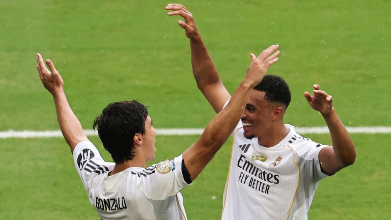 Gonzalo Garcia celebrates with Trent Alexander-Arnold after scoring Real Madrid's winner against Juventus