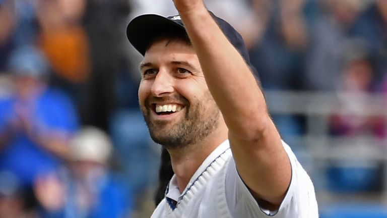 England's Mark Wood holds up the ball to celebrate his five-wicket haul during the first day of the third Ashes Test match between England and Australia at Headingley, Leeds, England, Thursday, July 6, 2023. (AP Photo/Rui Vieira)