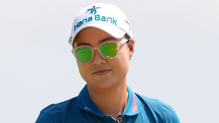 Minjee Lee waves her ball after sinking a putt on the first green during the final round of the Women's PGA Championship golf tournament Sunday, June 22, 2025, in Frisco, Texas. (AP Photo/LM Otero)